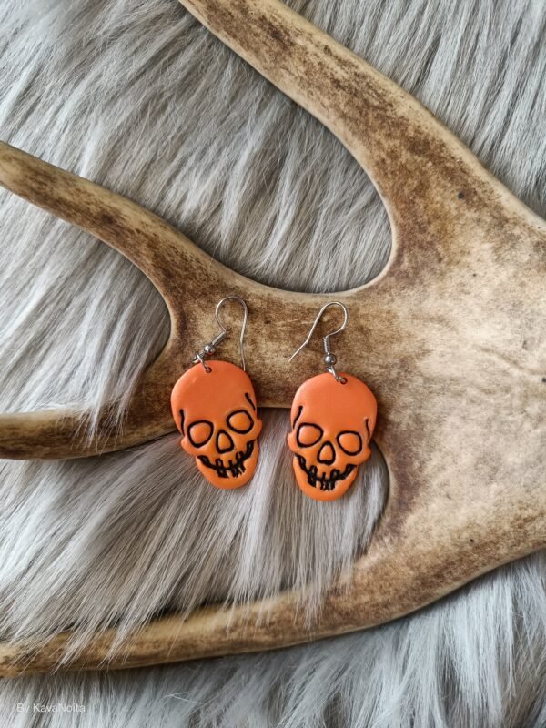 IMG20260219153855 Pääkallo-korvakorut, oranssi metallinhohto