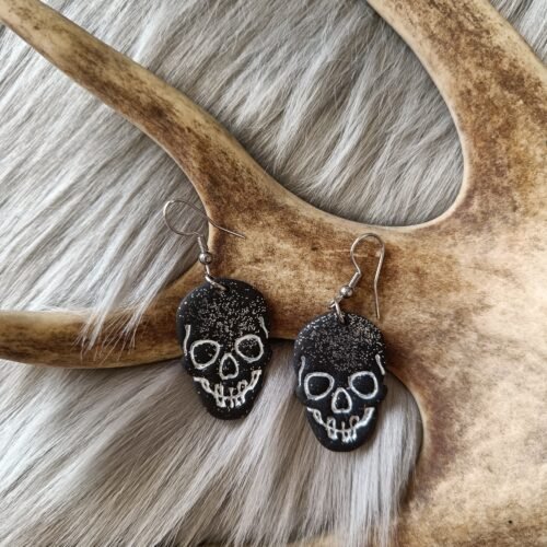 Pääkallo-korvakorut, musta glitter