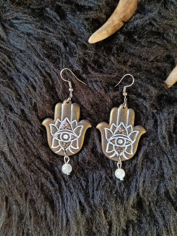 Hamsa-korvakorut, metallinhohto