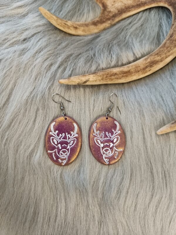 IMG20251110143637 Poro-korvakorut, violetti/kulta