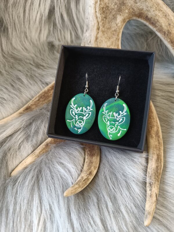 Poro-korvakorut, vihreä revontuli