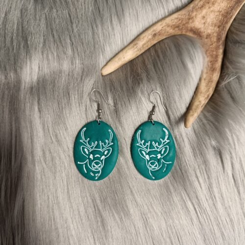 Poro-korvakorut, smaragdin vihreä