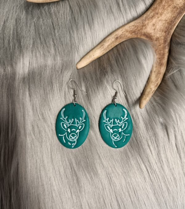 Poro-korvakorut, smaragdin vihreä