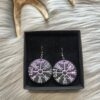 IMG20260512150229 Vegvisir-korvakorut, musta/violetti metallinhohto