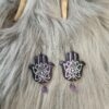 IMG20260831152512 Hamsa-korvakorut, musta /violetti metallinhohto