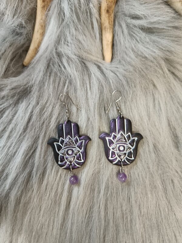 IMG20260831152512 Hamsa-korvakorut, musta /violetti metallinhohto