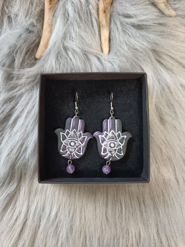 IMG20260831152555 Hamsa-korvakorut, musta /violetti metallinhohto