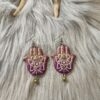 IMG20260831153951 Hamsa-korvakorut, violetti/kulta glitter