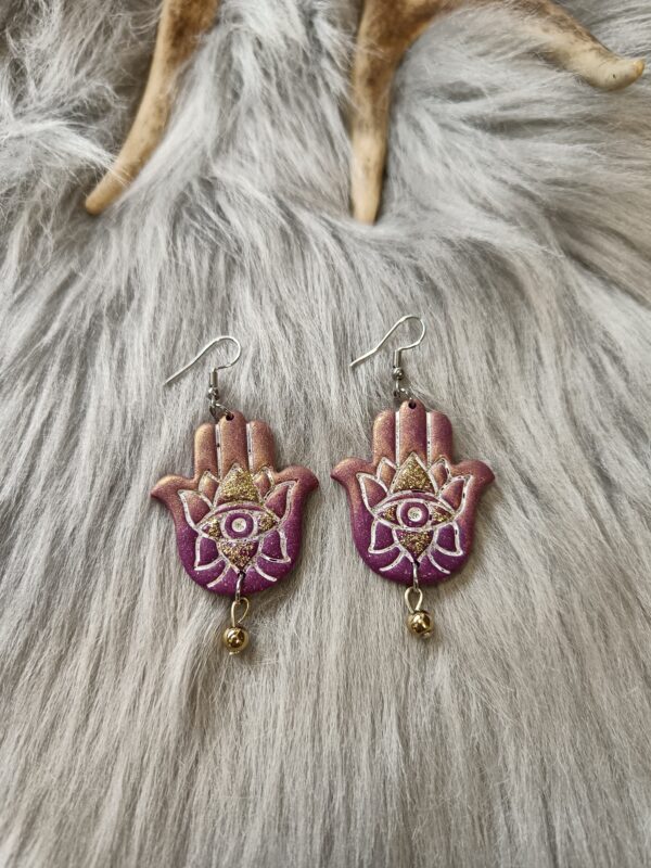 IMG20260831153951 Hamsa-korvakorut, violetti/kulta glitter